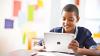 boy reading from an ipad